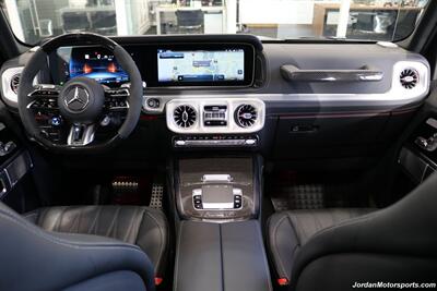 2025 Mercedes-Benz AMG G 63  1-OWNER* FULL PPF ON FRONT NOSE* MONZA GREY MAGNO-CARBON FIBER INTERIOR TRIM-22 " AMG WHEELS-EXCLUSIVE INTERIOR PLUS-AMG NIGHT PACKAGE MAGNOAMG PERFORMANCE STEERING WHEEL-BLACK MAGNO ROOF* - Photo 20 - Portland, OR 97230