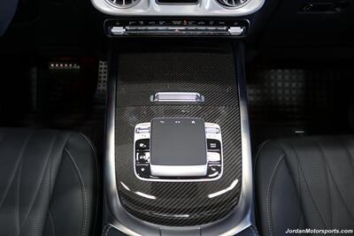 2025 Mercedes-Benz AMG G 63  1-OWNER* FULL PPF ON FRONT NOSE* MONZA GREY MAGNO-CARBON FIBER INTERIOR TRIM-22 " AMG WHEELS-EXCLUSIVE INTERIOR PLUS-AMG NIGHT PACKAGE MAGNOAMG PERFORMANCE STEERING WHEEL-BLACK MAGNO ROOF* - Photo 23 - Portland, OR 97230