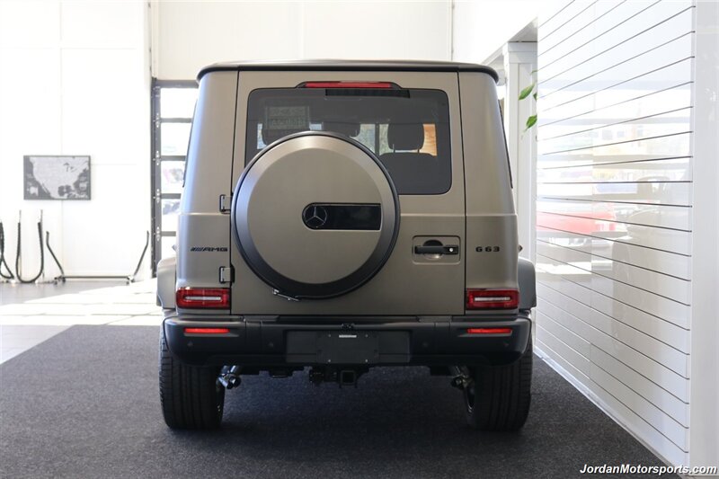 2025 Mercedes-Benz AMG G 63  1-OWNER* FULL PPF ON FRONT NOSE* MONZA GREY MAGNO-CARBON FIBER INTERIOR TRIM-22 " AMG WHEELS-EXCLUSIVE INTERIOR PLUS-AMG NIGHT PACKAGE MAGNOAMG PERFORMANCE STEERING WHEEL-BLACK MAGNO ROOF* - Photo 56 - Portland, OR 97230
