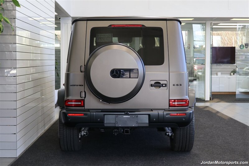 2025 Mercedes-Benz AMG G 63  1-OWNER* FULL PPF ON FRONT NOSE* MONZA GREY MAGNO-CARBON FIBER INTERIOR TRIM-22 " AMG WHEELS-EXCLUSIVE INTERIOR PLUS-AMG NIGHT PACKAGE MAGNOAMG PERFORMANCE STEERING WHEEL-BLACK MAGNO ROOF* - Photo 9 - Portland, OR 97230