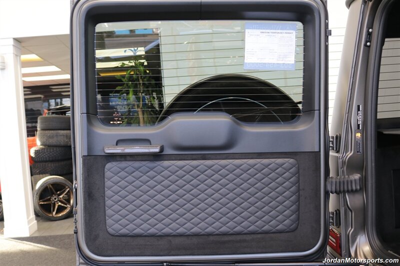 2025 Mercedes-Benz AMG G 63  1-OWNER* FULL PPF ON FRONT NOSE* MONZA GREY MAGNO-CARBON FIBER INTERIOR TRIM-22 " AMG WHEELS-EXCLUSIVE INTERIOR PLUS-AMG NIGHT PACKAGE MAGNOAMG PERFORMANCE STEERING WHEEL-BLACK MAGNO ROOF* - Photo 51 - Portland, OR 97230