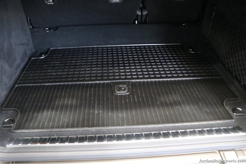 2025 Mercedes-Benz AMG G 63  1-OWNER* FULL PPF ON FRONT NOSE* MONZA GREY MAGNO-CARBON FIBER INTERIOR TRIM-22 " AMG WHEELS-EXCLUSIVE INTERIOR PLUS-AMG NIGHT PACKAGE MAGNOAMG PERFORMANCE STEERING WHEEL-BLACK MAGNO ROOF* - Photo 52 - Portland, OR 97230