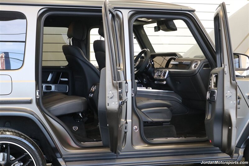 2025 Mercedes-Benz AMG G 63  1-OWNER* FULL PPF ON FRONT NOSE* MONZA GREY MAGNO-CARBON FIBER INTERIOR TRIM-22 " AMG WHEELS-EXCLUSIVE INTERIOR PLUS-AMG NIGHT PACKAGE MAGNOAMG PERFORMANCE STEERING WHEEL-BLACK MAGNO ROOF* - Photo 54 - Portland, OR 97230