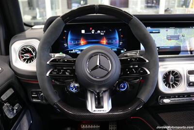 2025 Mercedes-Benz AMG G 63  1-OWNER* FULL PPF ON FRONT NOSE* MONZA GREY MAGNO-CARBON FIBER INTERIOR TRIM-22 " AMG WHEELS-EXCLUSIVE INTERIOR PLUS-AMG NIGHT PACKAGE MAGNOAMG PERFORMANCE STEERING WHEEL-BLACK MAGNO ROOF* - Photo 21 - Portland, OR 97230