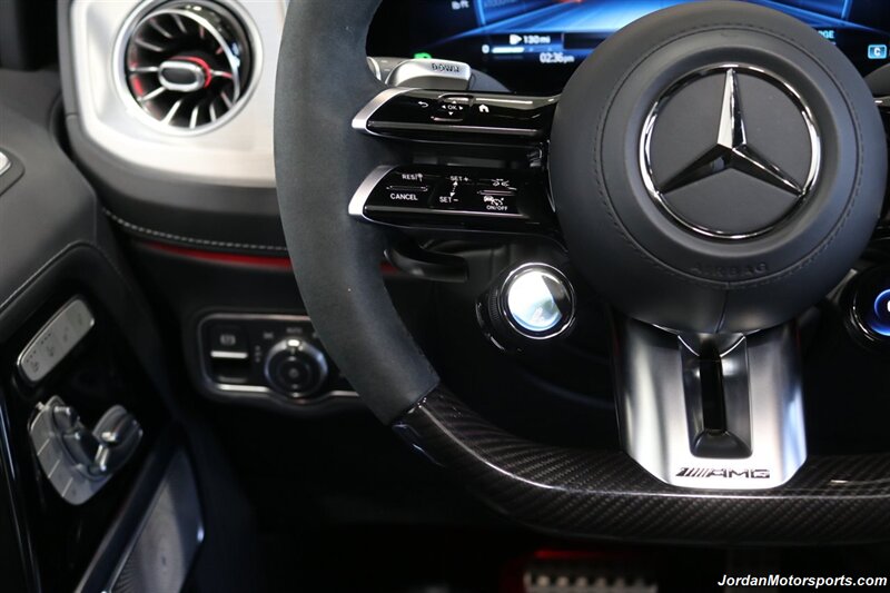 2025 Mercedes-Benz AMG G 63  1-OWNER* FULL PPF ON FRONT NOSE* MONZA GREY MAGNO-CARBON FIBER INTERIOR TRIM-22 " AMG WHEELS-EXCLUSIVE INTERIOR PLUS-AMG NIGHT PACKAGE MAGNOAMG PERFORMANCE STEERING WHEEL-BLACK MAGNO ROOF* - Photo 46 - Portland, OR 97230