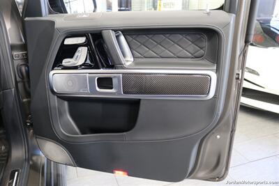 2025 Mercedes-Benz AMG G 63  1-OWNER* FULL PPF ON FRONT NOSE* MONZA GREY MAGNO-CARBON FIBER INTERIOR TRIM-22 " AMG WHEELS-EXCLUSIVE INTERIOR PLUS-AMG NIGHT PACKAGE MAGNOAMG PERFORMANCE STEERING WHEEL-BLACK MAGNO ROOF* - Photo 41 - Portland, OR 97230