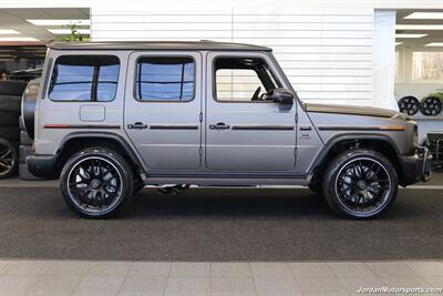 2025 Mercedes-Benz AMG G 63  1-OWNER* FULL PPF ON FRONT NOSE* MONZA GREY MAGNO-CARBON FIBER INTERIOR TRIM-22 " AMG WHEELS-EXCLUSIVE INTERIOR PLUS-AMG NIGHT PACKAGE MAGNOAMG PERFORMANCE STEERING WHEEL-BLACK MAGNO ROOF* - Photo 5 - Portland, OR 97230
