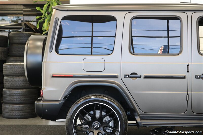 2025 Mercedes-Benz AMG G 63  1-OWNER* FULL PPF ON FRONT NOSE* MONZA GREY MAGNO-CARBON FIBER INTERIOR TRIM-22 " AMG WHEELS-EXCLUSIVE INTERIOR PLUS-AMG NIGHT PACKAGE MAGNOAMG PERFORMANCE STEERING WHEEL-BLACK MAGNO ROOF* - Photo 29 - Portland, OR 97230