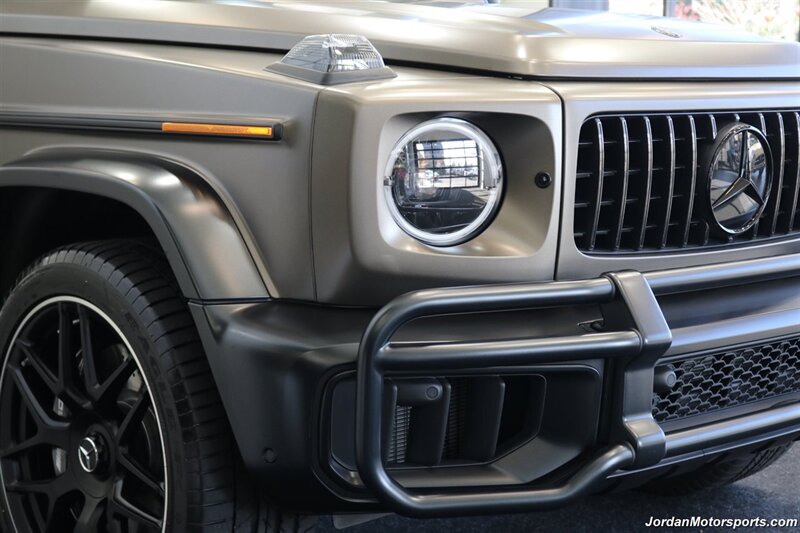 2025 Mercedes-Benz AMG G 63  1-OWNER* FULL PPF ON FRONT NOSE* MONZA GREY MAGNO-CARBON FIBER INTERIOR TRIM-22 " AMG WHEELS-EXCLUSIVE INTERIOR PLUS-AMG NIGHT PACKAGE MAGNOAMG PERFORMANCE STEERING WHEEL-BLACK MAGNO ROOF* - Photo 11 - Portland, OR 97230