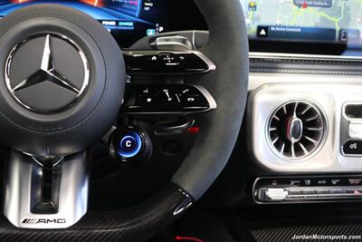 2025 Mercedes-Benz AMG G 63  1-OWNER* FULL PPF ON FRONT NOSE* MONZA GREY MAGNO-CARBON FIBER INTERIOR TRIM-22 " AMG WHEELS-EXCLUSIVE INTERIOR PLUS-AMG NIGHT PACKAGE MAGNOAMG PERFORMANCE STEERING WHEEL-BLACK MAGNO ROOF* - Photo 47 - Portland, OR 97230