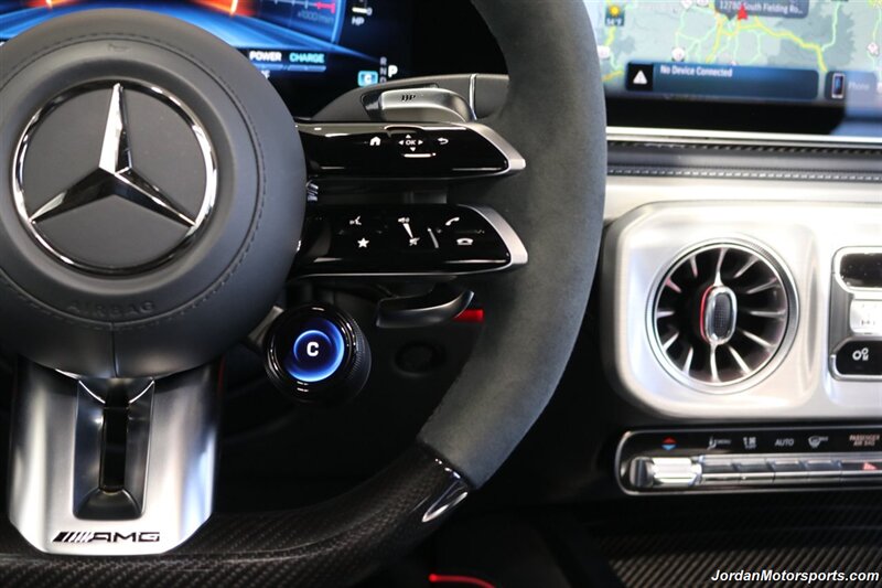 2025 Mercedes-Benz AMG G 63  1-OWNER* FULL PPF ON FRONT NOSE* MONZA GREY MAGNO-CARBON FIBER INTERIOR TRIM-22 " AMG WHEELS-EXCLUSIVE INTERIOR PLUS-AMG NIGHT PACKAGE MAGNOAMG PERFORMANCE STEERING WHEEL-BLACK MAGNO ROOF* - Photo 47 - Portland, OR 97230