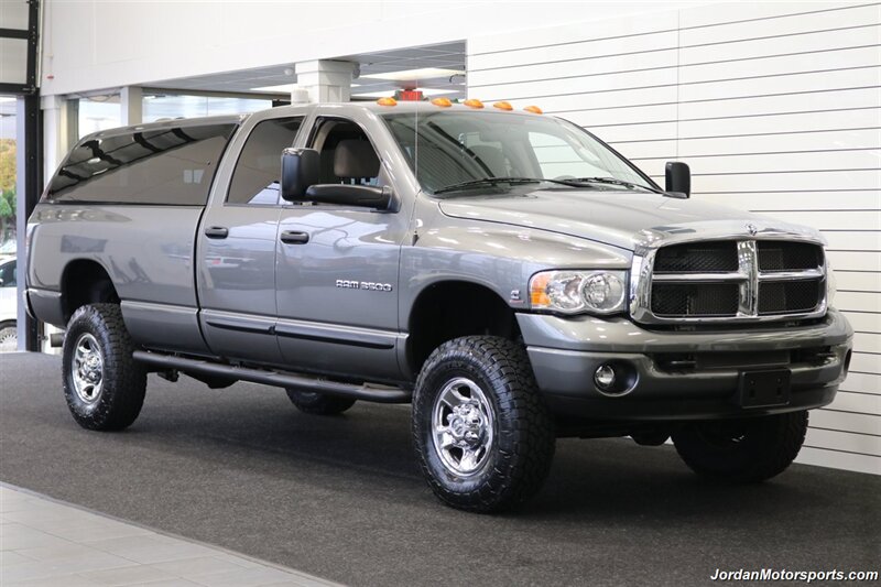 2005 Dodge Ram 3500 SLT 6-SPEED MANUAL 5.9L* NEVER HAD 5TH WHEEL OR GOOSNECK* FULL FRONT END SUSPENSION NEW REBUILD* CARLI 3 "LEVEL LIFT W/BILSTEIN 5100 SHOCKS* 34 " TOYO A/T III 10-PLYS* LEER CANOPY* LINEX BED LINER - Photo 2 - Portland, OR 97230