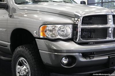 2005 Dodge Ram 3500 SLT 6-SPEED MANUAL 5.9L* NEVER HAD 5TH WHEEL OR GOOSNECK* FULL FRONT END SUSPENSION NEW REBUILD* CARLI 3 "LEVEL LIFT W/BILSTEIN 5100 SHOCKS* 34 " TOYO A/T III 10-PLYS* LEER CANOPY* LINEX BED LINER - Photo 11 - Portland, OR 97230