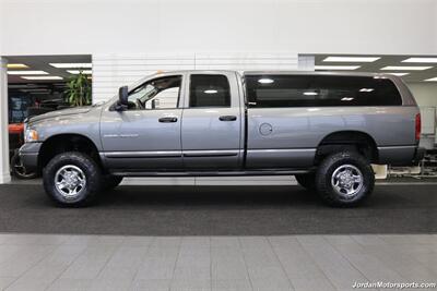 2005 Dodge Ram 3500 SLT 6-SPEED MANUAL 5.9L* NEVER HAD 5TH WHEEL OR GOOSNECK* FULL FRONT END SUSPENSION NEW REBUILD* CARLI 3 "LEVEL LIFT W/BILSTEIN 5100 SHOCKS* 34 " TOYO A/T III 10-PLYS* LEER CANOPY* LINEX BED LINER - Photo 4 - Portland, OR 97230