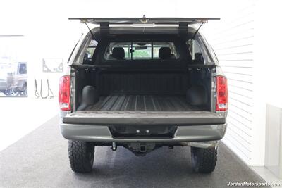 2005 Dodge Ram 3500 SLT 6-SPEED MANUAL 5.9L* NEVER HAD 5TH WHEEL OR GOOSNECK* FULL FRONT END SUSPENSION NEW REBUILD* CARLI 3 "LEVEL LIFT W/BILSTEIN 5100 SHOCKS* 34 " TOYO A/T III 10-PLYS* LEER CANOPY* LINEX BED LINER - Photo 15 - Portland, OR 97230