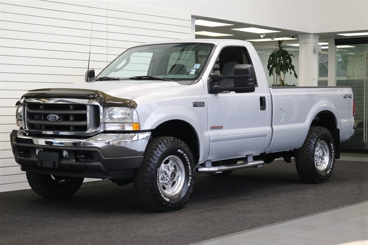 2003 Ford F-250 XLT  JUST HAD 10K FULL ENGINE BULLETPROOFING WITH ARP HEAD STUDS AND GASKETS-OIL & EGR COOLER - S&B INTAKE* 4 "EXHAUST- FULL TOP END UPGRADE* NEW 33 " BFG KO3 10-PLYS* REMOTE START* 0-RUST - Photo 1 - Portland, OR 97230