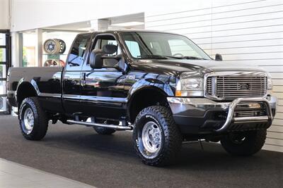 2001 Ford F-250 XLT  1-OWNER* 100% RUST FREE* NEW 2.5 " LEVEL KIT W/ NEW 35 " BFG KO3 10-PLYs* ALL SERVICE RECORDS SINCE NEW @FORD DEALER* NEW BRAKES-ROTORS-CALIPERS-COOLANT FLUSH-BRAKE FLUID-THERMOSTAT* ALL BOOKS & KEYS - Photo 2 - Portland, OR 97230