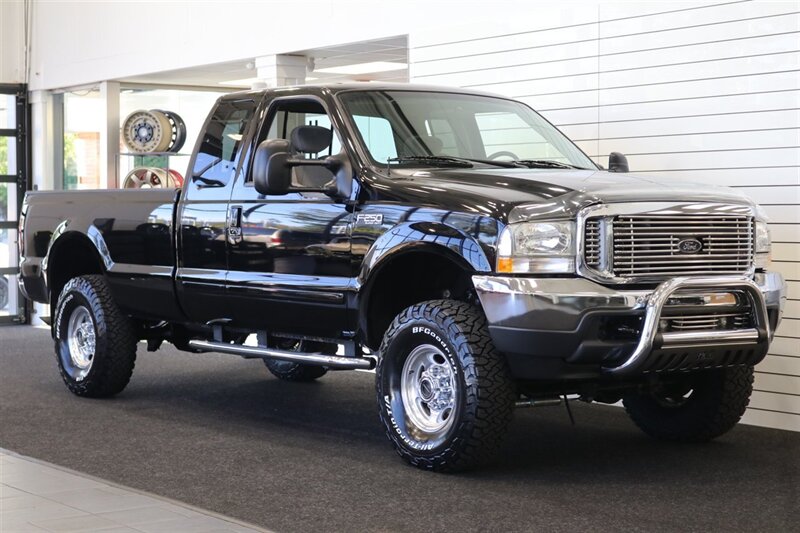 2001 Ford F-250 XLT  1-OWNER* 100% RUST FREE* NEW 2.5 " LEVEL KIT W/ NEW 35 " BFG KO3 10-PLYs* ALL SERVICE RECORDS SINCE NEW @FORD DEALER* NEW BRAKES-ROTORS-CALIPERS-COOLANT FLUSH-BRAKE FLUID-THERMOSTAT* ALL BOOKS & KEYS - Photo 2 - Portland, OR 97230