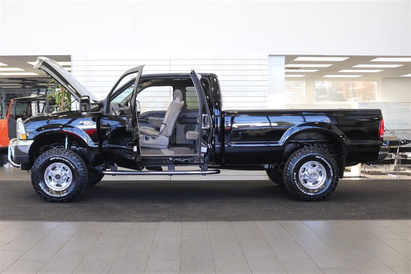 2001 Ford F-250 XLT  1-OWNER* 100% RUST FREE* NEW 2.5 " LEVEL KIT W/ NEW 35 " BFG KO3 10-PLYs* ALL SERVICE RECORDS SINCE NEW @FORD DEALER* NEW BRAKES-ROTORS-CALIPERS-COOLANT FLUSH-BRAKE FLUID-THERMOSTAT* ALL BOOKS & KEYS - Photo 10 - Portland, OR 97230