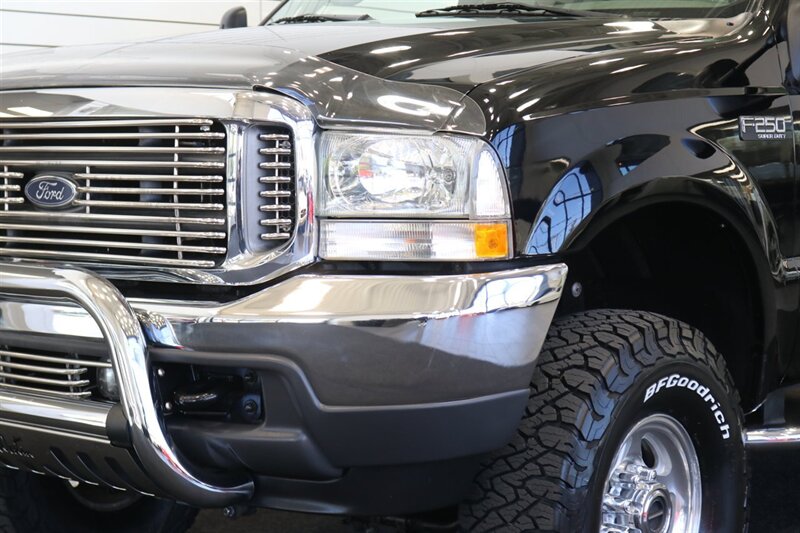 2001 Ford F-250 XLT  1-OWNER* 100% RUST FREE* NEW 2.5 " LEVEL KIT W/ NEW 35 " BFG KO3 10-PLYs* ALL SERVICE RECORDS SINCE NEW @FORD DEALER* NEW BRAKES-ROTORS-CALIPERS-COOLANT FLUSH-BRAKE FLUID-THERMOSTAT* ALL BOOKS & KEYS - Photo 12 - Portland, OR 97230