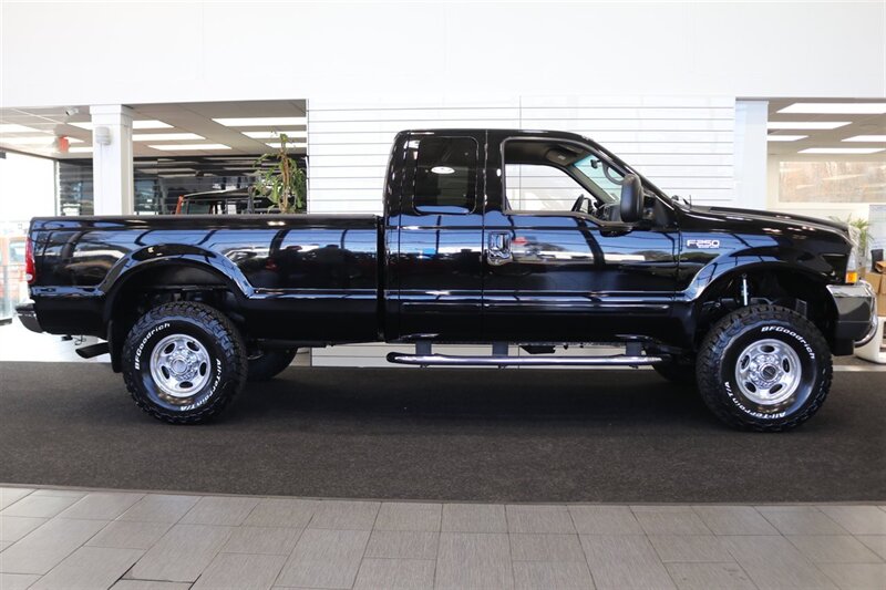 2001 Ford F-250 XLT  1-OWNER* 100% RUST FREE* NEW 2.5 " LEVEL KIT W/ NEW 35 " BFG KO3 10-PLYs* ALL SERVICE RECORDS SINCE NEW @FORD DEALER* NEW BRAKES-ROTORS-CALIPERS-COOLANT FLUSH-BRAKE FLUID-THERMOSTAT* ALL BOOKS & KEYS - Photo 5 - Portland, OR 97230