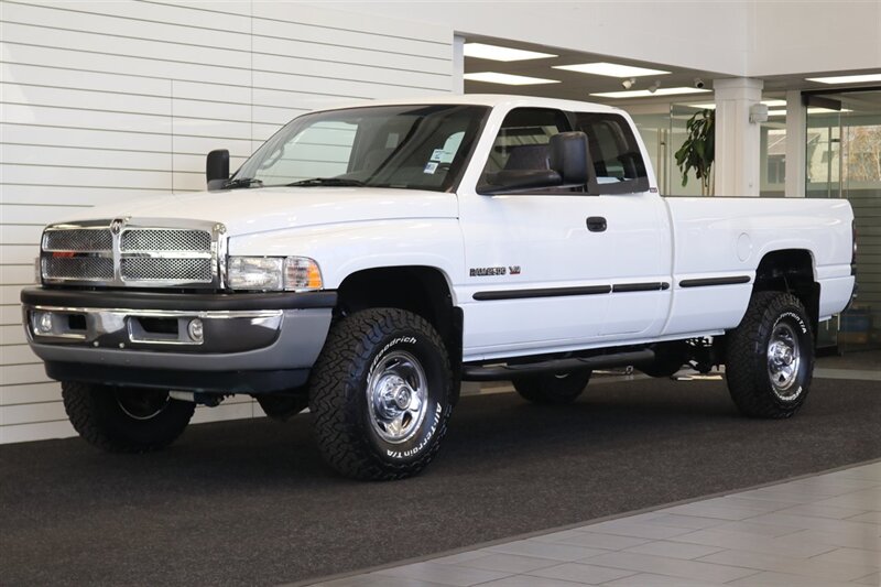 White 1999 Dodge RAM 2500 Laramie SLT Quad Cab 4WD Pickup Truck Four-Wheel Drive 5-Speed Manual