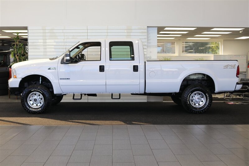 2001 Ford F-350 xlt  100% RUST FREE* NEVER HAD A 5TH WHEEL OR GOOSNECK* NEW 2.5 " LEVEL KIT W/ BILSTEIN 5100s* LONG BED 8FT* LINEX BED LINER* NEW BRAKES-ROTORS-CALIBERS-SWAY BAR LINKS-AC SERVICE-ALL FLUIDS - Photo 4 - Portland, OR 97230