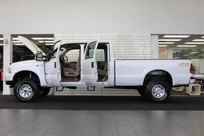 2001 Ford F-350 xlt  100% RUST FREE* NEVER HAD A 5TH WHEEL OR GOOSNECK* NEW 2.5 " LEVEL KIT W/ BILSTEIN 5100s* LONG BED 8FT* LINEX BED LINER* NEW BRAKES-ROTORS-CALIBERS-SWAY BAR LINKS-AC SERVICE-ALL FLUIDS - Photo 10 - Portland, OR 97230