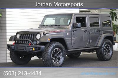 2017 Jeep Wrangler Rubicon Hard Rock  HARD ROCK RUBICON W/ 6-SPEED MANUAL TRANSMISSION* 2 " TERRA FLEX W/ FOX SHOCKS* NEW 35 " TOYO A/T III TIRES* ROCK SLIDERS* ALL LED LIGHT UPGRADE PKG* ALL BOOKS & KEYS - Photo 1 - Portland, OR 97230