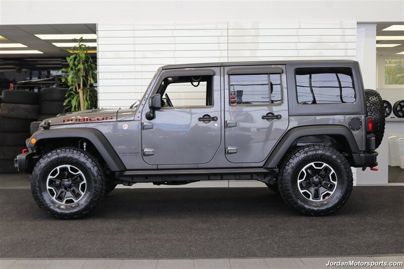2017 Jeep Wrangler Rubicon Hard Rock  HARD ROCK RUBICON W/ 6-SPEED MANUAL TRANSMISSION* 2 " TERRA FLEX W/ FOX SHOCKS* NEW 35 " TOYO A/T III TIRES* ROCK SLIDERS* ALL LED LIGHT UPGRADE PKG* ALL BOOKS & KEYS - Photo 4 - Portland, OR 97230