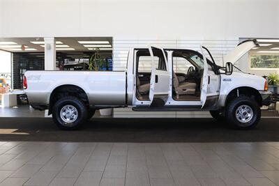 2000 Ford F-250 Lariat  1-OWNER* 100% RUST & CORROSION FREE* NEW 2.5 "LEVEL LIFT W/ BILSTEIN 5100s* NEW 35 " TOYO A/T III 10-PLYs* AIR LIFT REAR AIR BAGS* FULL FRESH SERVICE W/ NEW FLUIDS* ALL BOOKS & KEYS* LARIAT LONG BED - Photo 11 - Portland, OR 97230
