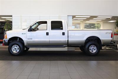 2000 Ford F-250 Lariat  1-OWNER* 100% RUST & CORROSION FREE* NEW 2.5 "LEVEL LIFT W/ BILSTEIN 5100s* NEW 35 " TOYO A/T III 10-PLYs* AIR LIFT REAR AIR BAGS* FULL FRESH SERVICE W/ NEW FLUIDS* ALL BOOKS & KEYS* LARIAT LONG BED - Photo 4 - Portland, OR 97230