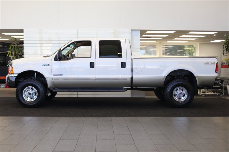 2000 Ford F-250 Lariat  1-OWNER* 100% RUST & CORROSION FREE* NEW 2.5 "LEVEL LIFT W/ BILSTEIN 5100s* NEW 35 " TOYO A/T III 10-PLYs* AIR LIFT REAR AIR BAGS* FULL FRESH SERVICE W/ NEW FLUIDS* ALL BOOKS & KEYS* LARIAT LONG BED - Photo 4 - Portland, OR 97230