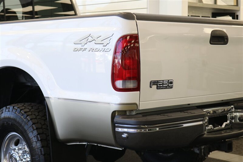 2000 Ford F-250 Lariat  1-OWNER* 100% RUST & CORROSION FREE* NEW 2.5 "LEVEL LIFT W/ BILSTEIN 5100s* NEW 35 " TOYO A/T III 10-PLYs* AIR LIFT REAR AIR BAGS* FULL FRESH SERVICE W/ NEW FLUIDS* ALL BOOKS & KEYS* LARIAT LONG BED - Photo 43 - Portland, OR 97230
