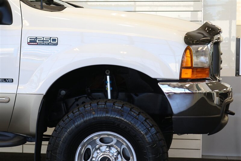 2000 Ford F-250 Lariat  1-OWNER* 100% RUST & CORROSION FREE* NEW 2.5 "LEVEL LIFT W/ BILSTEIN 5100s* NEW 35 " TOYO A/T III 10-PLYs* AIR LIFT REAR AIR BAGS* FULL FRESH SERVICE W/ NEW FLUIDS* ALL BOOKS & KEYS* LARIAT LONG BED - Photo 55 - Portland, OR 97230