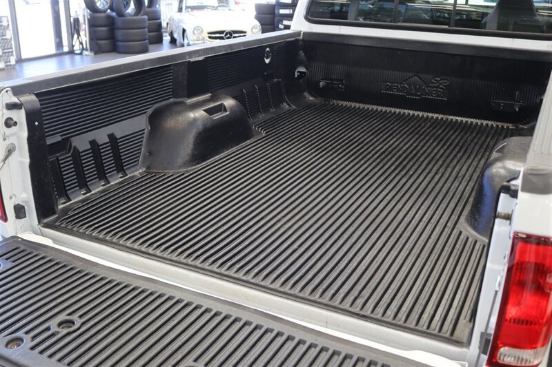 2000 Ford F-250 Lariat  1-OWNER* 100% RUST & CORROSION FREE* NEW 2.5 "LEVEL LIFT W/ BILSTEIN 5100s* NEW 35 " TOYO A/T III 10-PLYs* AIR LIFT REAR AIR BAGS* FULL FRESH SERVICE W/ NEW FLUIDS* ALL BOOKS & KEYS* LARIAT LONG BED - Photo 45 - Portland, OR 97230