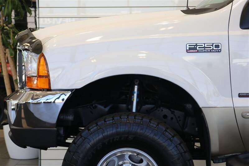 2000 Ford F-250 Lariat  1-OWNER* 100% RUST & CORROSION FREE* NEW 2.5 "LEVEL LIFT W/ BILSTEIN 5100s* NEW 35 " TOYO A/T III 10-PLYs* AIR LIFT REAR AIR BAGS* FULL FRESH SERVICE W/ NEW FLUIDS* ALL BOOKS & KEYS* LARIAT LONG BED - Photo 54 - Portland, OR 97230