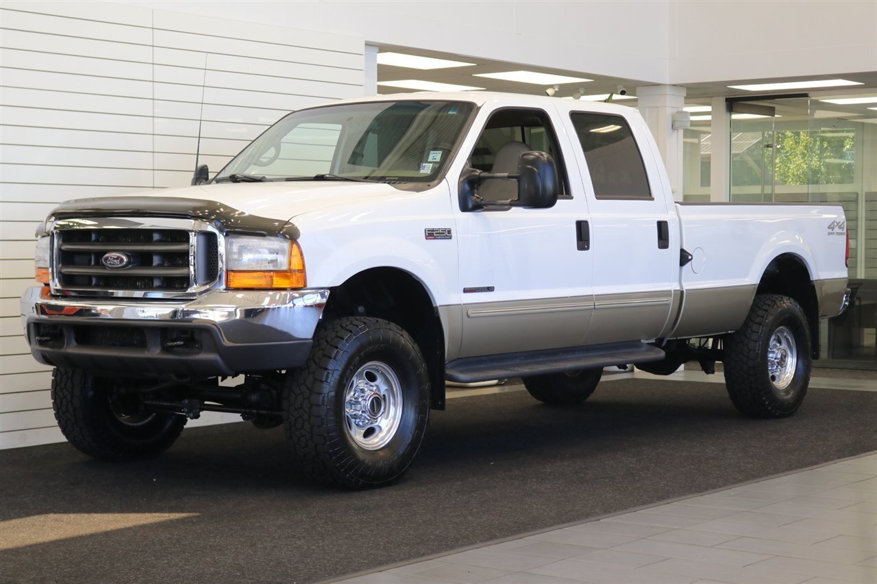 2000 Ford F-250 Lariat  1-OWNER* 100% RUST & CORROSION FREE* NEW 2.5 "LEVEL LIFT W/ BILSTEIN 5100s* NEW 35 " TOYO A/T III 10-PLYs* AIR LIFT REAR AIR BAGS* FULL FRESH SERVICE W/ NEW FLUIDS* ALL BOOKS & KEYS* LARIAT LONG BED - Photo 1 - Portland, OR 97230