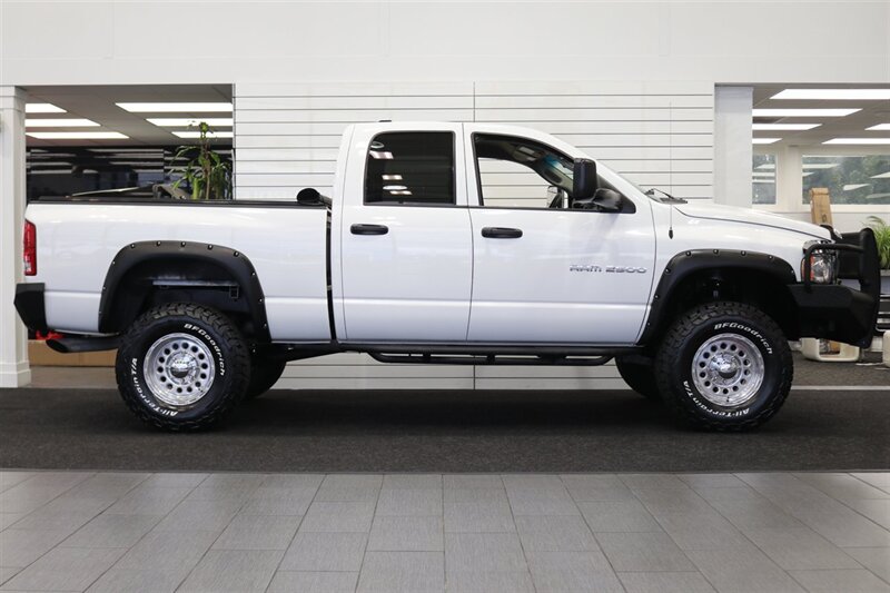 2004 Dodge Ram 2500 SLT 4dr Quad Cab SLT 1-OWNER* 100% RUST FREE* NEW 3 " LEVEL KIT W/ BILSTEIN 5100 SHOCKS* NEW 35 " BFG KO3 12-PLY W/ NEW 17 " WHEELS* NEVER HAD A 5TH WHEEL OR GOOSENECK* ALL SERVICE RECDS SINCE NEW - Photo 5 - Portland, OR 97230