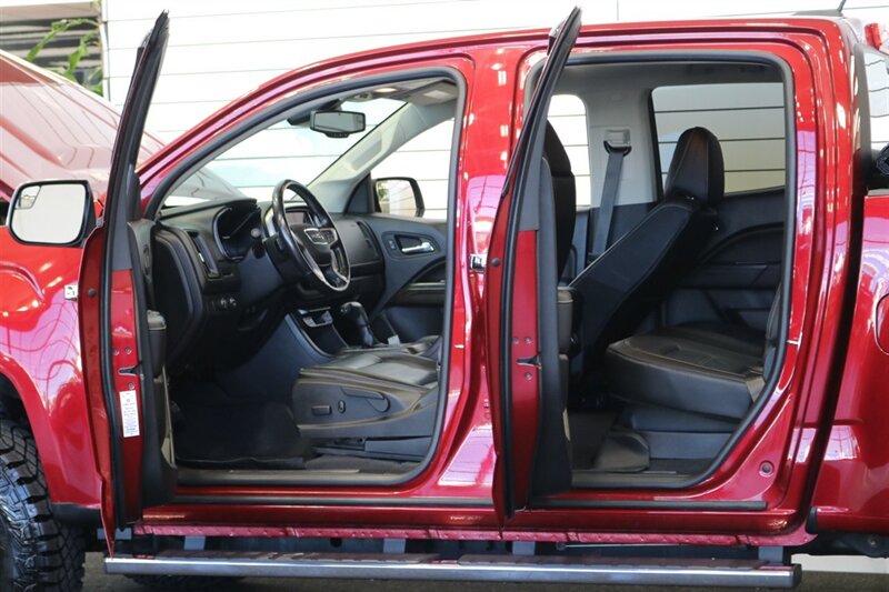 2020 GMC Canyon Denali  STAGE 2 EIBACH PRO 2.0 ADJUSTABLE COIL OVERS* ICON UPPER ARMS* 18 " FUEL WHEELS* 33.5 " GOODYEAR TIRES* BANKS PEDAL MONSTER* METAL FAB BUMPERS* TONNEAU COVER, LINEX BED LINER* ALL BOOKS & KEYS - Photo 46 - Portland, OR 97230