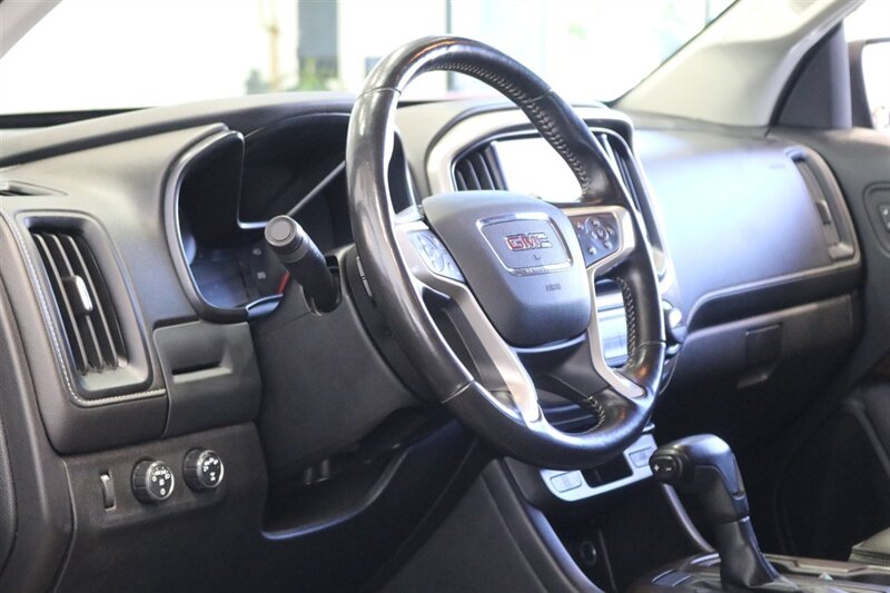 2020 GMC Canyon Denali  STAGE 2 EIBACH PRO 2.0 ADJUSTABLE COIL OVERS* ICON UPPER ARMS* 18 " FUEL WHEELS* 33.5 " GOODYEAR TIRES* BANKS PEDAL MONSTER* METAL FAB BUMPERS* TONNEAU COVER, LINEX BED LINER* ALL BOOKS & KEYS - Photo 68 - Portland, OR 97230