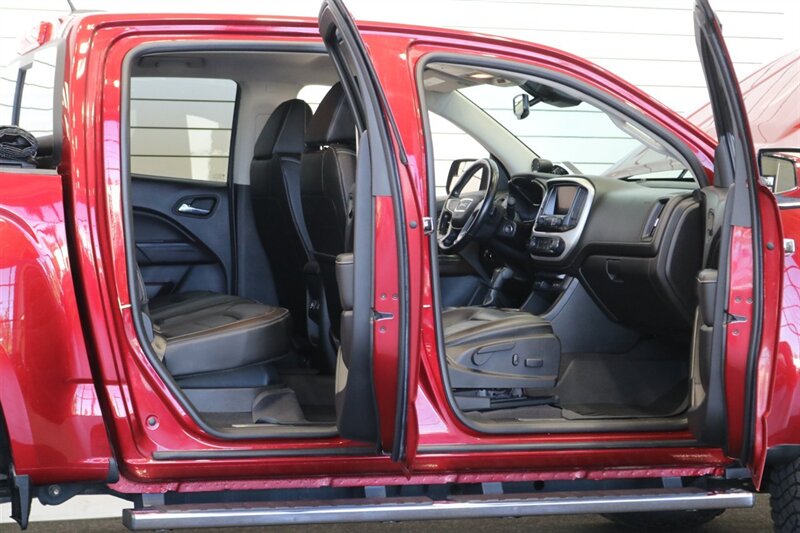 2020 GMC Canyon Denali  STAGE 2 EIBACH PRO 2.0 ADJUSTABLE COIL OVERS* ICON UPPER ARMS* 18 " FUEL WHEELS* 33.5 " GOODYEAR TIRES* BANKS PEDAL MONSTER* METAL FAB BUMPERS* TONNEAU COVER, LINEX BED LINER* ALL BOOKS & KEYS - Photo 47 - Portland, OR 97230