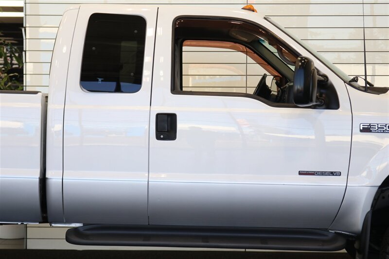 2000 Ford F-350 xlt 2-OWNER* NEW 3 "LEVEL LIFT W/BILSTEIN 5100 SHOCKS* NEW BFG KO3s* NEW WHEELS* COOLANT-BRAKE FLUID FLUSHES* NEW AC COMPRESSOR W/CHARGE* NEW BATTERIES* DEALER SERVICED SINCE NEW* NO RUST* ALL BOOKS & KEYS - Photo 59 - Portland, OR 97230
