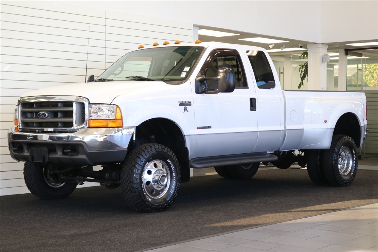 2000 Ford F-350 xlt  2-OWNER* NEW 3 "LEVEL LIFT W/BILSTEIN 5100 SHOCKS* NEW BFG KO3s* NEW WHEELS* COOLANT-BRAKE FLUID FLUSHES* NEW AC COMPRESSOR W/CHARGE* NEW BATTERIES* DEALER SERVICED SINCE NEW* NO RUST* ALL BOOKS & KEYS - Photo 1 - Portland, OR 97230