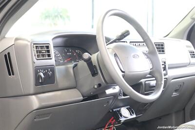 2002 Ford F-350 Lariat  1-OWNER* 100% RUST FREE* AFE INTAKE & FULL EXHAUST* NEW 2.5 "BILSTEIN LEVEL KIT* NEW 35 " BFG KO3 10-PLYs* ALL NEW BRAKE SYSTEM* ALL NEW FLUIDS* ALL SERVICE RECORDS* REAR AIRBAGS W/ ONBOARD AIR - Photo 78 - Portland, OR 97230