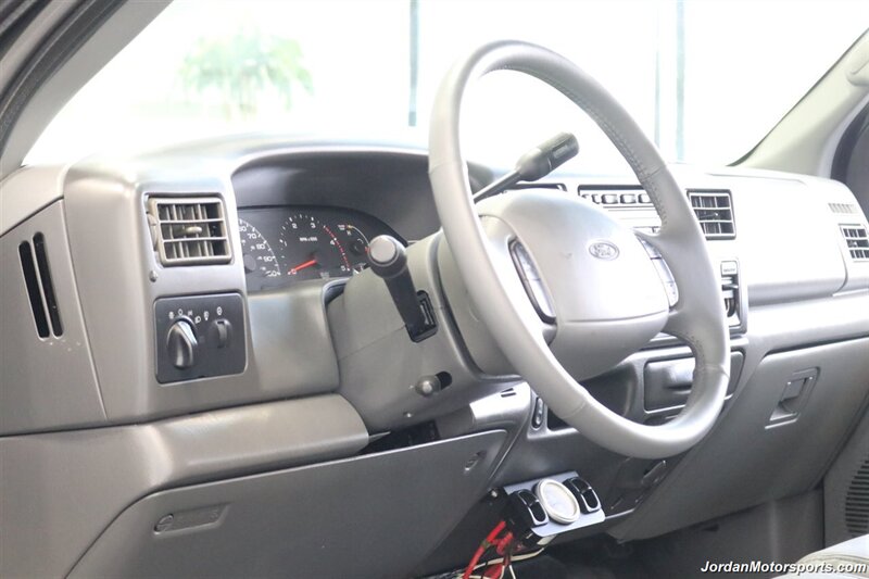 2002 Ford F-350 Lariat  1-OWNER* 100% RUST FREE* AFE INTAKE & FULL EXHAUST* NEW 2.5 "BILSTEIN LEVEL KIT* NEW 35 " BFG KO3 10-PLYs* ALL NEW BRAKE SYSTEM* ALL NEW FLUIDS* ALL SERVICE RECORDS* REAR AIRBAGS W/ ONBOARD AIR - Photo 78 - Portland, OR 97230