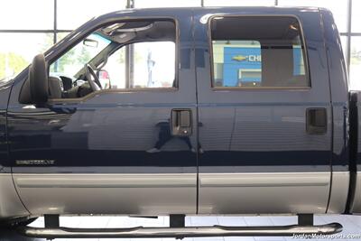 2002 Ford F-350 Lariat  1-OWNER* 100% RUST FREE* AFE INTAKE & FULL EXHAUST* NEW 2.5 "BILSTEIN LEVEL KIT* NEW 35 " BFG KO3 10-PLYs* ALL NEW BRAKE SYSTEM* ALL NEW FLUIDS* ALL SERVICE RECORDS* REAR AIRBAGS W/ ONBOARD AIR - Photo 54 - Portland, OR 97230