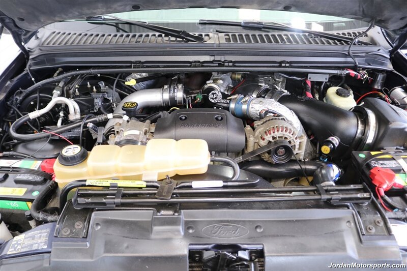 2002 Ford F-350 Lariat  1-OWNER* 100% RUST FREE* AFE INTAKE & FULL EXHAUST* NEW 2.5 "BILSTEIN LEVEL KIT* NEW 35 " BFG KO3 10-PLYs* ALL NEW BRAKE SYSTEM* ALL NEW FLUIDS* ALL SERVICE RECORDS* REAR AIRBAGS W/ ONBOARD AIR - Photo 14 - Portland, OR 97230