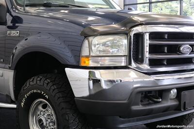 2002 Ford F-350 Lariat  1-OWNER* 100% RUST FREE* AFE INTAKE & FULL EXHAUST* NEW 2.5 "BILSTEIN LEVEL KIT* NEW 35 " BFG KO3 10-PLYs* ALL NEW BRAKE SYSTEM* ALL NEW FLUIDS* ALL SERVICE RECORDS* REAR AIRBAGS W/ ONBOARD AIR - Photo 13 - Portland, OR 97230