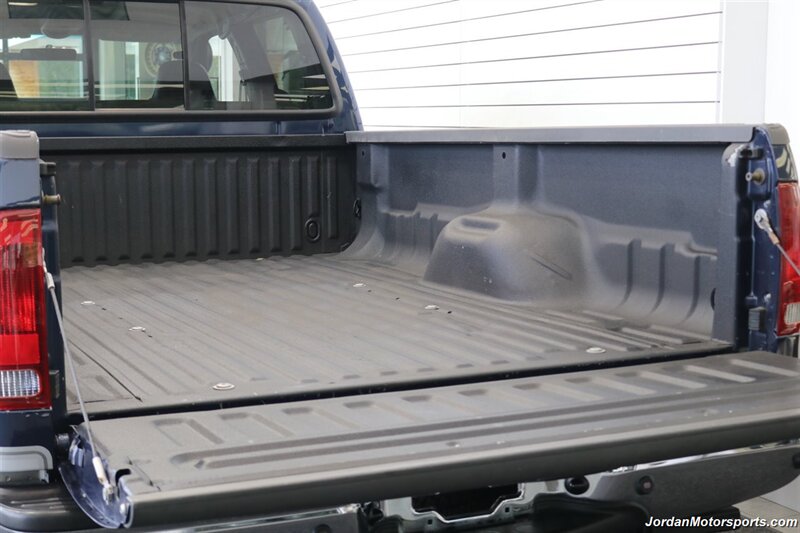 2002 Ford F-350 Lariat  1-OWNER* 100% RUST FREE* AFE INTAKE & FULL EXHAUST* NEW 2.5 "BILSTEIN LEVEL KIT* NEW 35 " BFG KO3 10-PLYs* ALL NEW BRAKE SYSTEM* ALL NEW FLUIDS* ALL SERVICE RECORDS* REAR AIRBAGS W/ ONBOARD AIR - Photo 44 - Portland, OR 97230